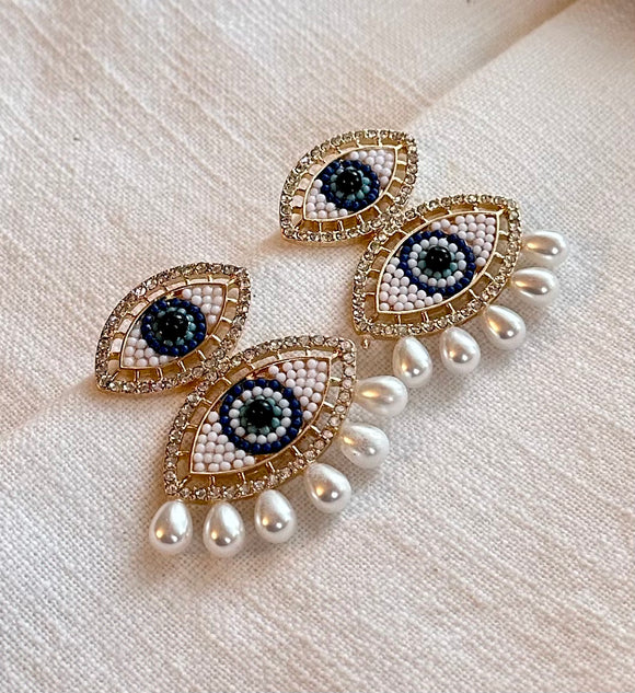 Double pearl evil eye earrings