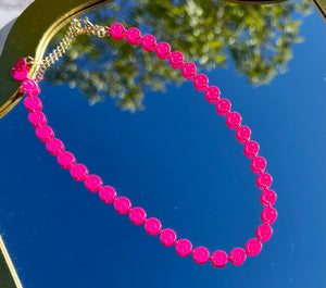 Pink happy face necklace